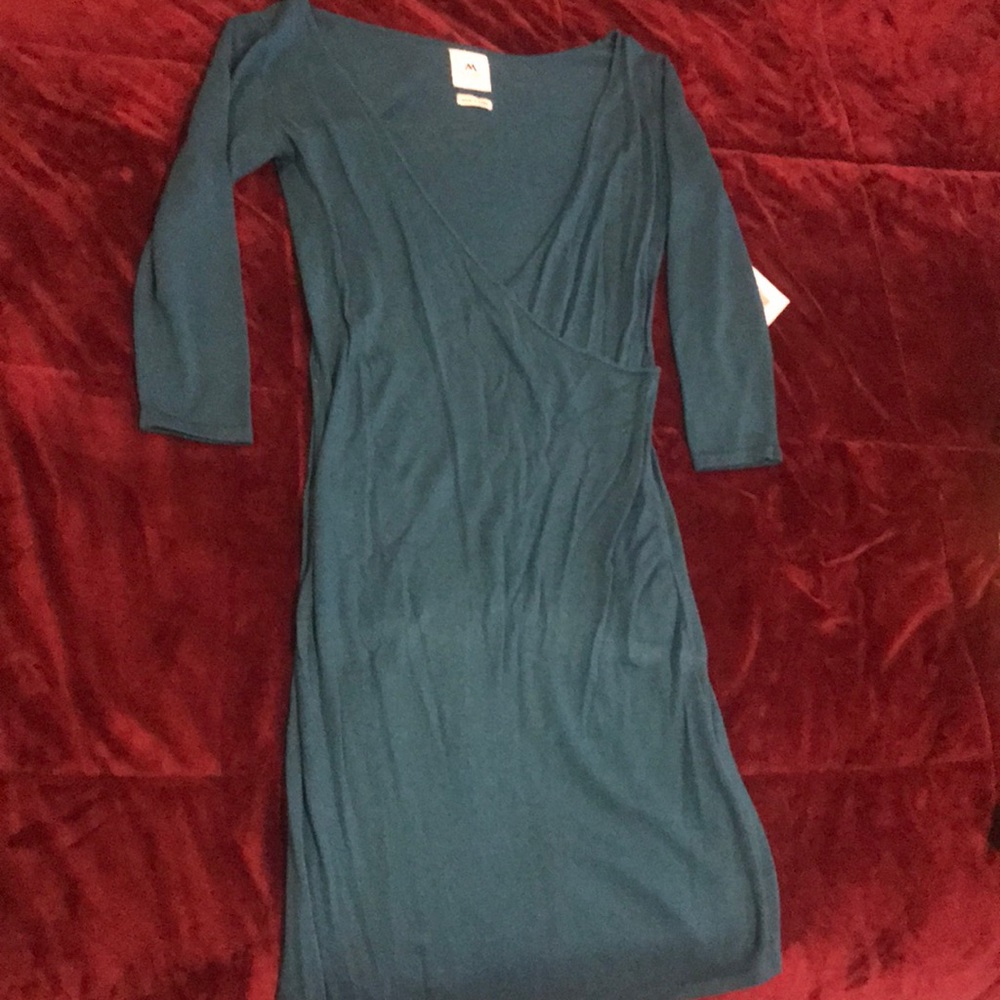 Long sleeve cross front dress.